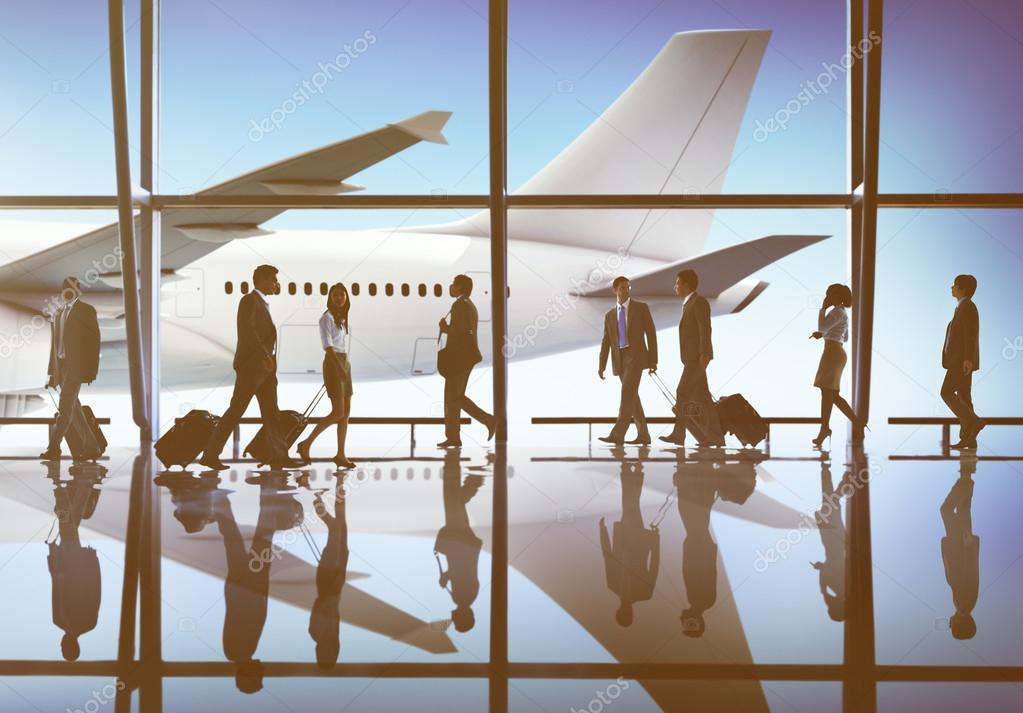 business people walking in airport