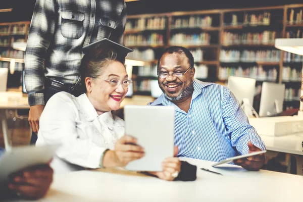 Diversity middle aged people studying — Stock Photo, Image