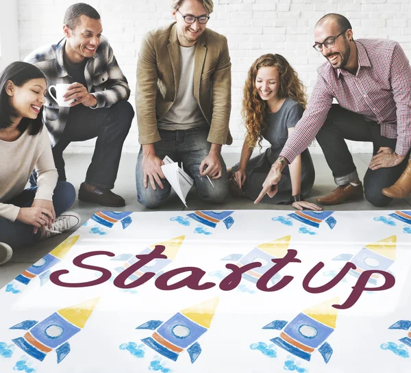 Designers working with poster and Startup — Stock Photo, Image