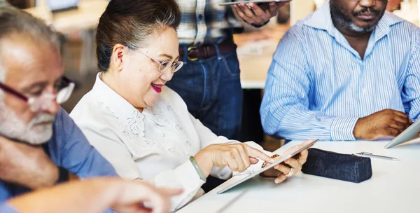 Middle aged people studying — Stock Photo, Image