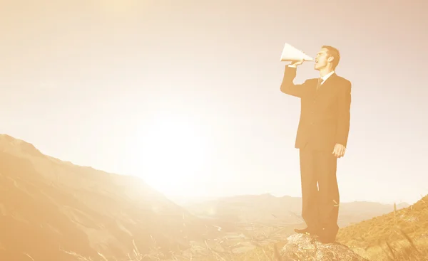 Empresario en traje con Megáfono — Foto de Stock