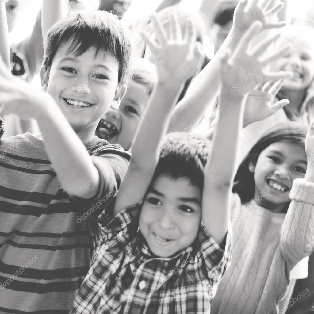 Children holding hands up