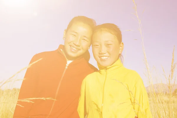 Mongolian girls together outdoors — Stock Photo, Image