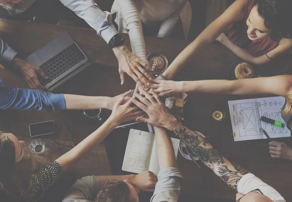 People making pile of hands — Stock Photo, Image