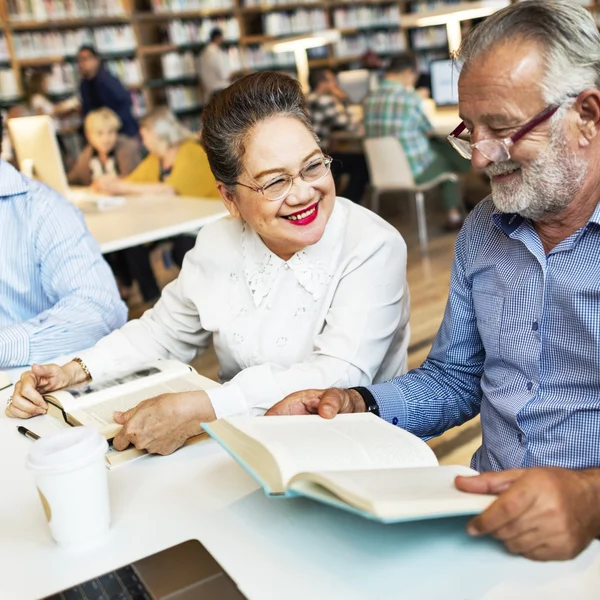 Middle aged people studying together — Stock Photo, Image