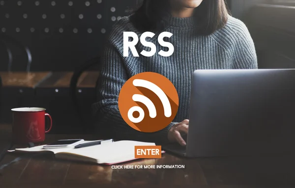 Woman typing on laptop with rss — Stock Photo, Image