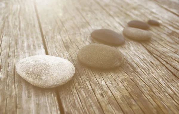 Wooden floor and stones — Stock Photo, Image