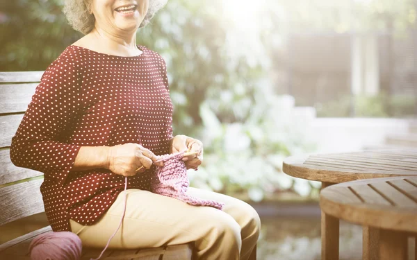 Grandma crocheting Concept — стоковое фото