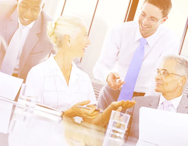 Group of business people at corporate meeting — Stock Photo, Image