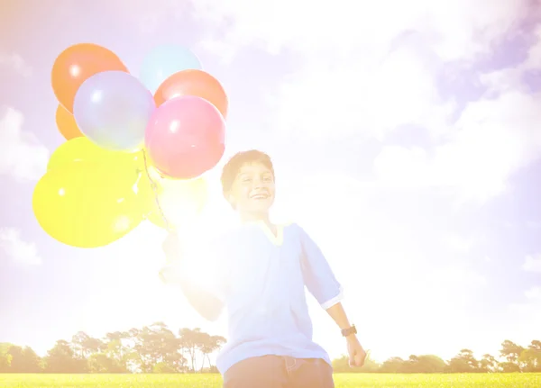 Birthday boy Outdoors with balloons — Stock fotografie