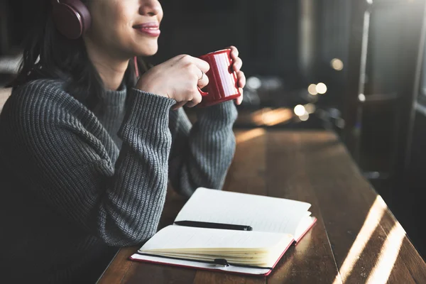 woman drinking coffee