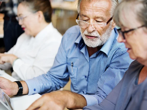 Middle aged people studying — Stock Photo, Image