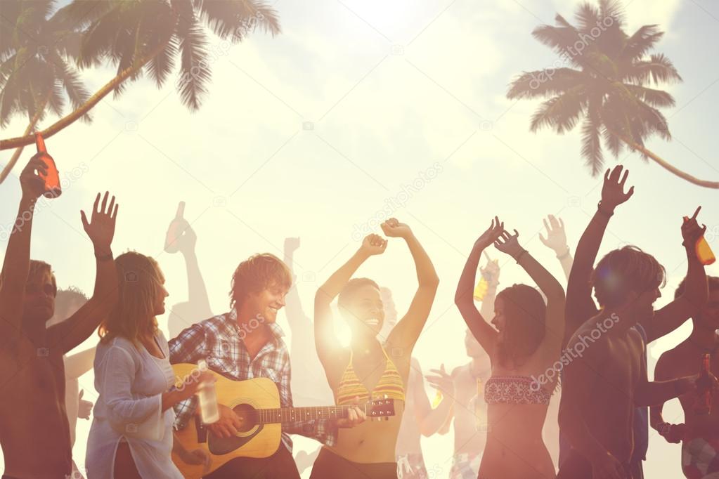 People enjoying beach party