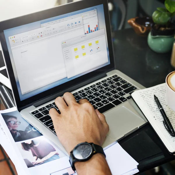 Young handsome man using digital device — Stock Photo, Image