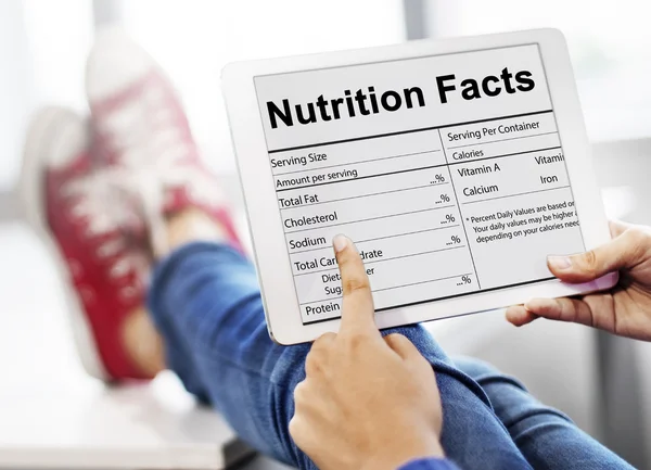 Digital tablet with nutrition facts — Stock Photo, Image