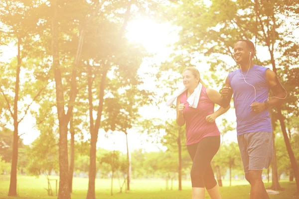 Man and woman doing physical activity together — Stock Photo, Image