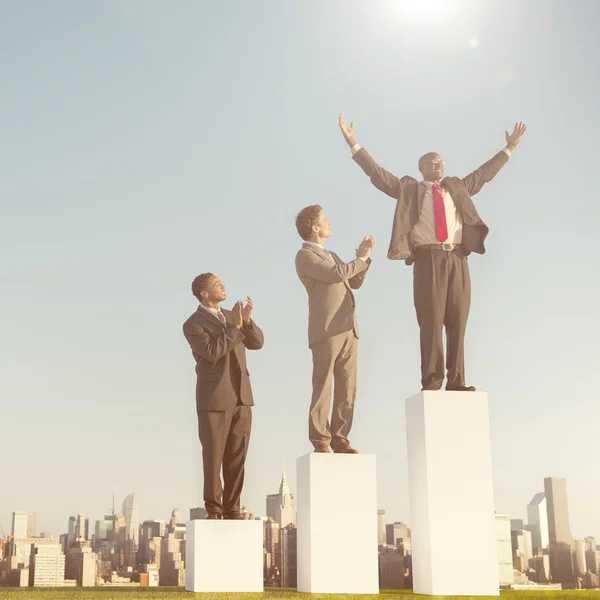 Business people standing on growth chart — Stock Photo, Image