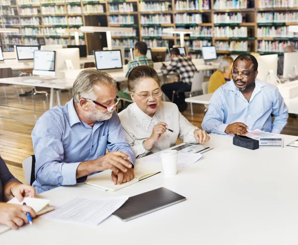 Mature students studying together — Stock Photo, Image