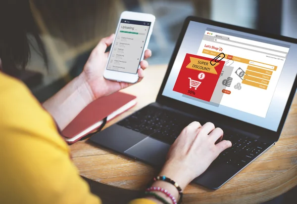 stock image woman typing on laptop