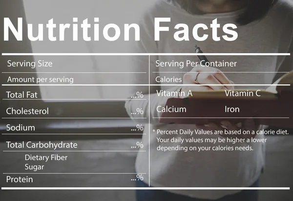 女性栄養事実をノートに書く — ストック写真