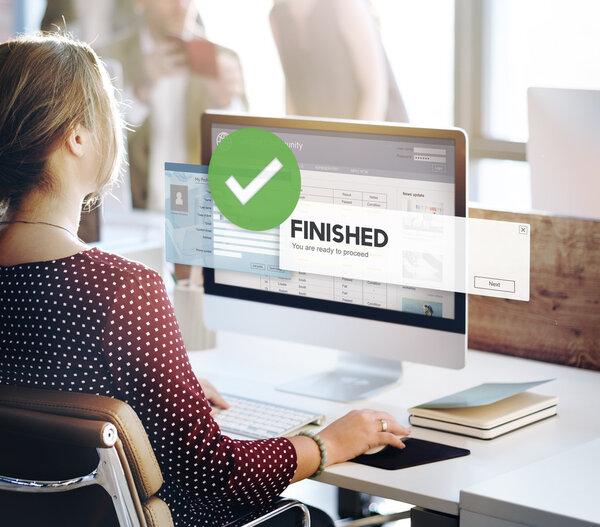 businesswoman working on computer with finished