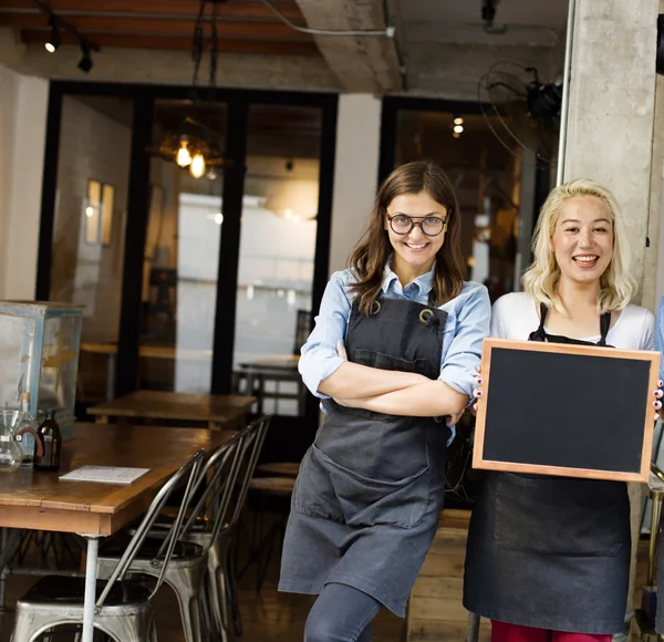 Woman holding Blackboard — Stockfoto