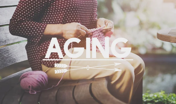 Senior woman with  Needlework — Stock Photo, Image