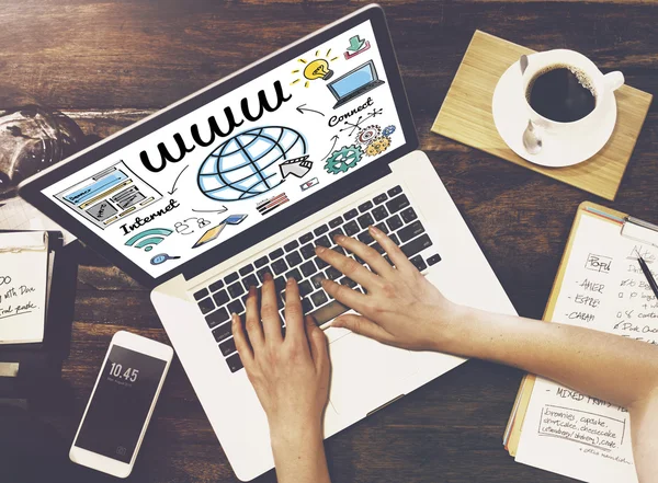 Woman using laptop at office — Stock Photo, Image