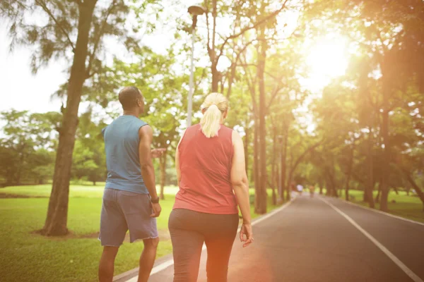 Man and woman doing physical activity together — Stock Photo, Image