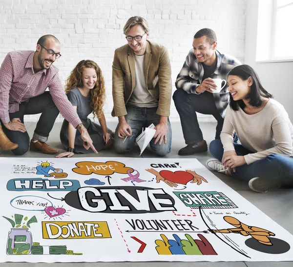 Designers working with poster and give — Stock Photo, Image
