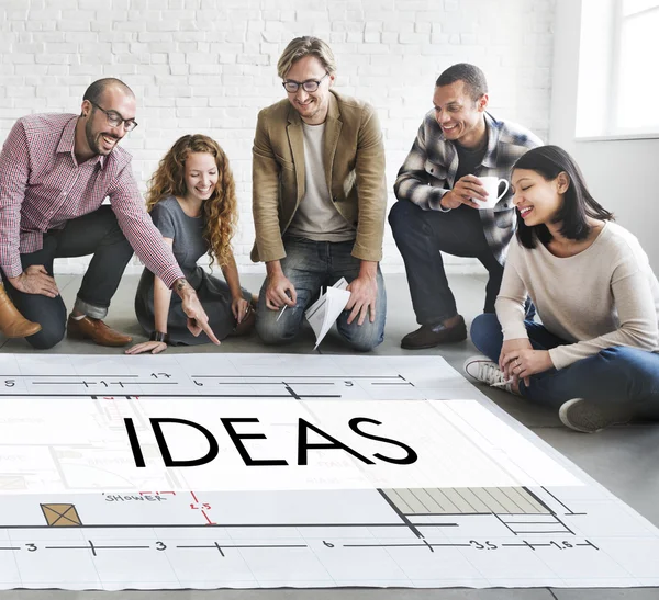 Designers working with poster and ideas — Stock Photo, Image