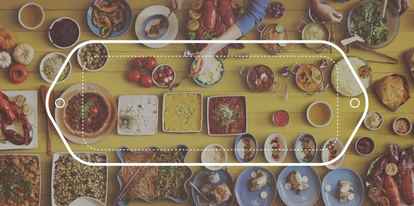 Friends eating for table and badge — Stock Photo, Image