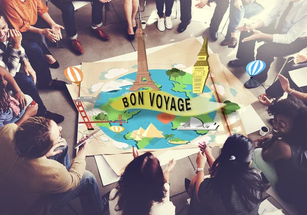 Människor över affisch med bon voyage — Stockfoto