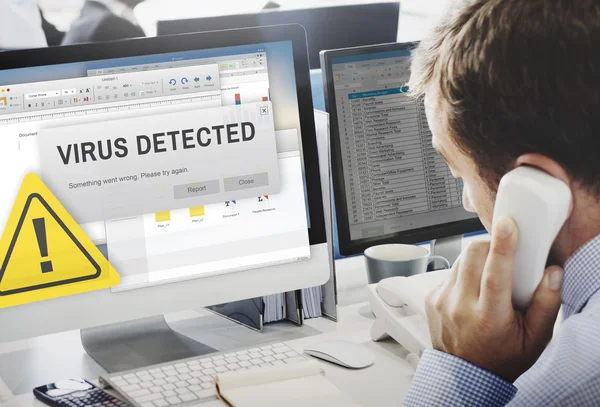 Businessman working on computer with Virus Detected — Stock Photo, Image