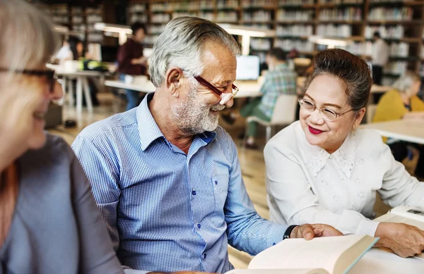 Middle aged people studying — Stock Photo, Image