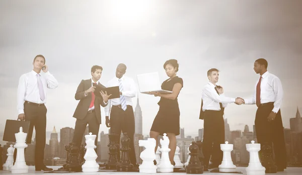 Team of Business People with chess — Stockfoto