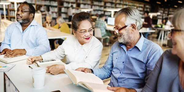 Mature students studying together — Stock Photo, Image