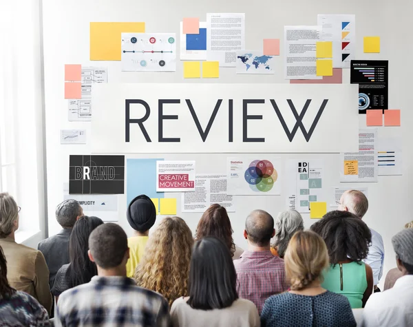 People at seminar with review — Stock Photo, Image