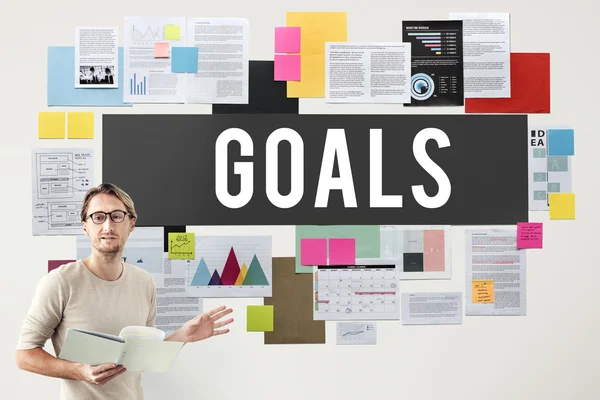 Businessman working with goals — Stock Photo, Image