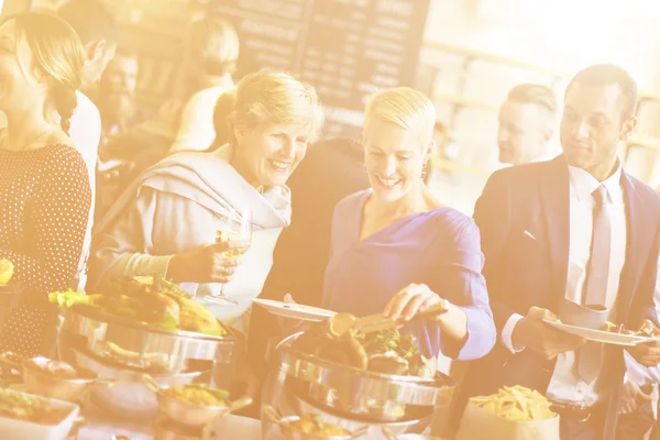 People with cups and plates — Stock Photo, Image