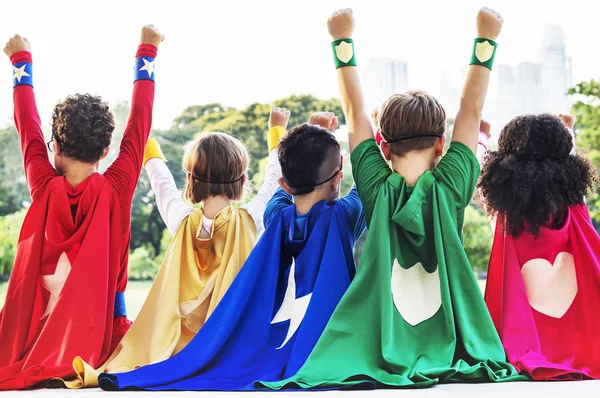 Superhero Kids playing outdoor — Stock Photo, Image