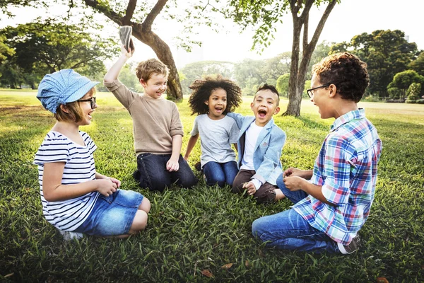 Funny kids playing outdoors — Stock Photo, Image