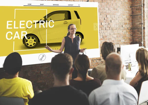 People at conference with electric car — Stock Photo, Image