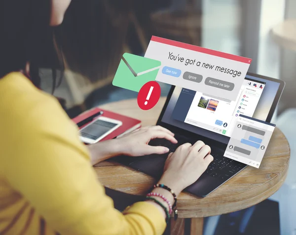 Portrait of woman with laptop and phone — Stock Photo, Image