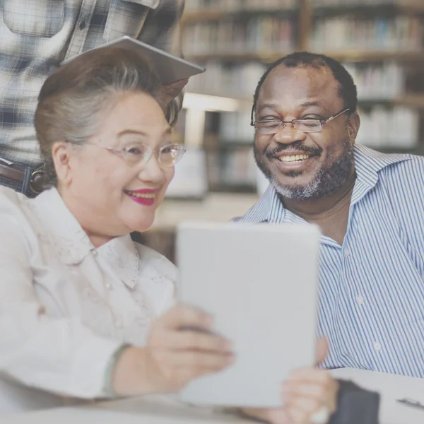 Diversity middle aged people studying — Stock Photo, Image