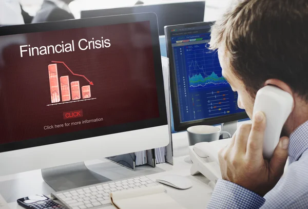 Businessman working on computer with Financial Crisis — Stock Photo, Image