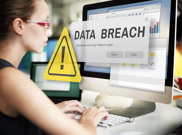 Businesswoman working on computer with Data Breach — Stock Photo, Image