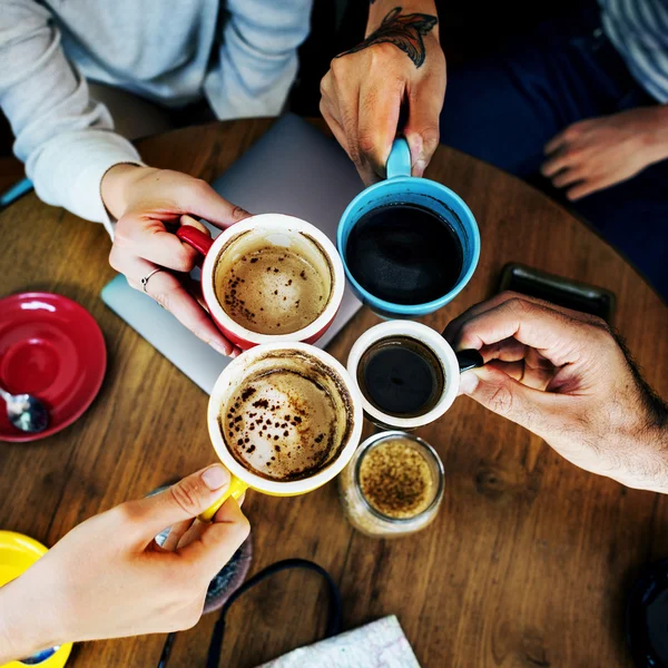 Friends drinking coffee in bar — Stock Photo, Image