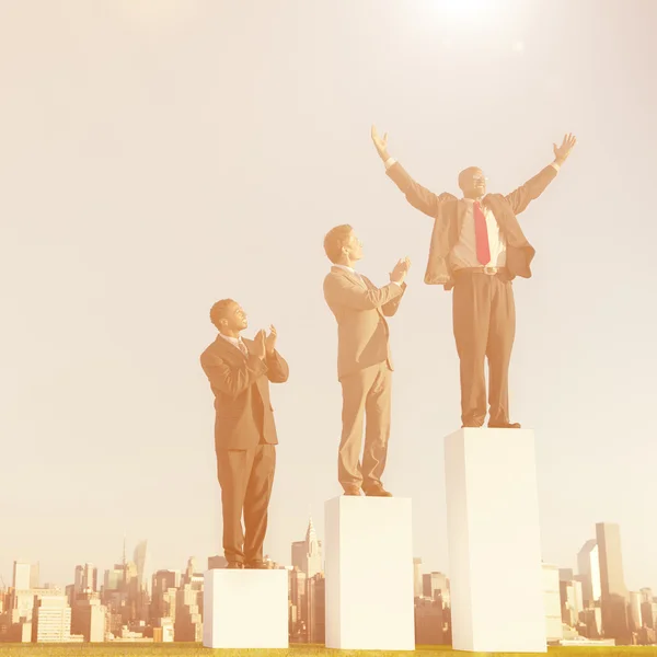 Business people standing on growth chart — Stock Photo, Image