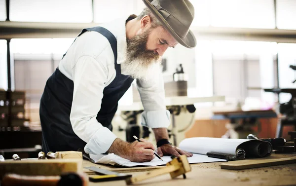 stock image Craftsman drawing in studio